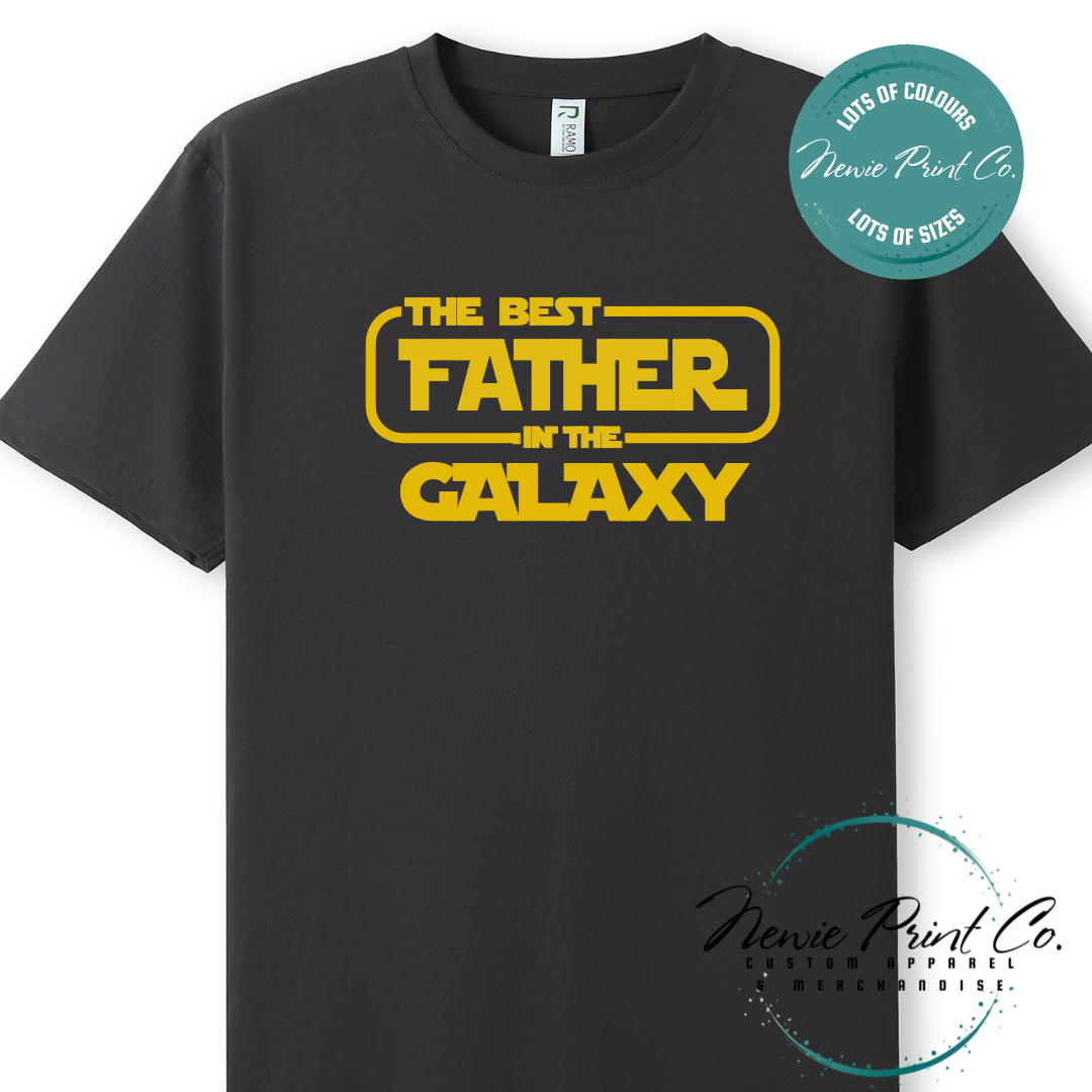 Funny t-shirt and jumper with the text “Best Father in the Galaxy customizable Humorous Star Wars-inspired quote printed on 100% cotton apparel using high-quality DTF/DTG print. Perfect gift for dads, Father’s Day.