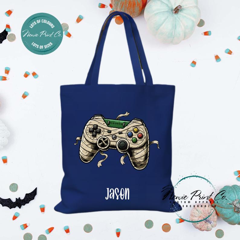 Custom Halloween tote bag with optional personalised name printed on the front, perfect for trick-or-treating or spooky season gifts