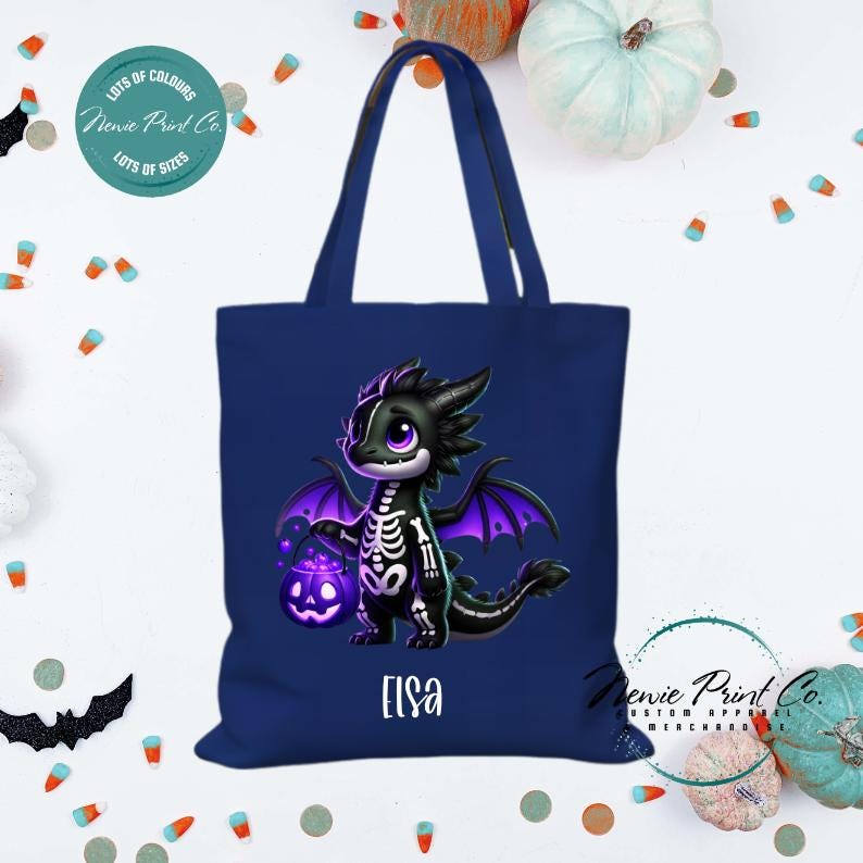 Custom Halloween tote bag with a cute black and purple dragon holding a pumpkin, optional personalised name printed on the front, perfect for trick-or-treating or spooky season gifts printed in Australia.