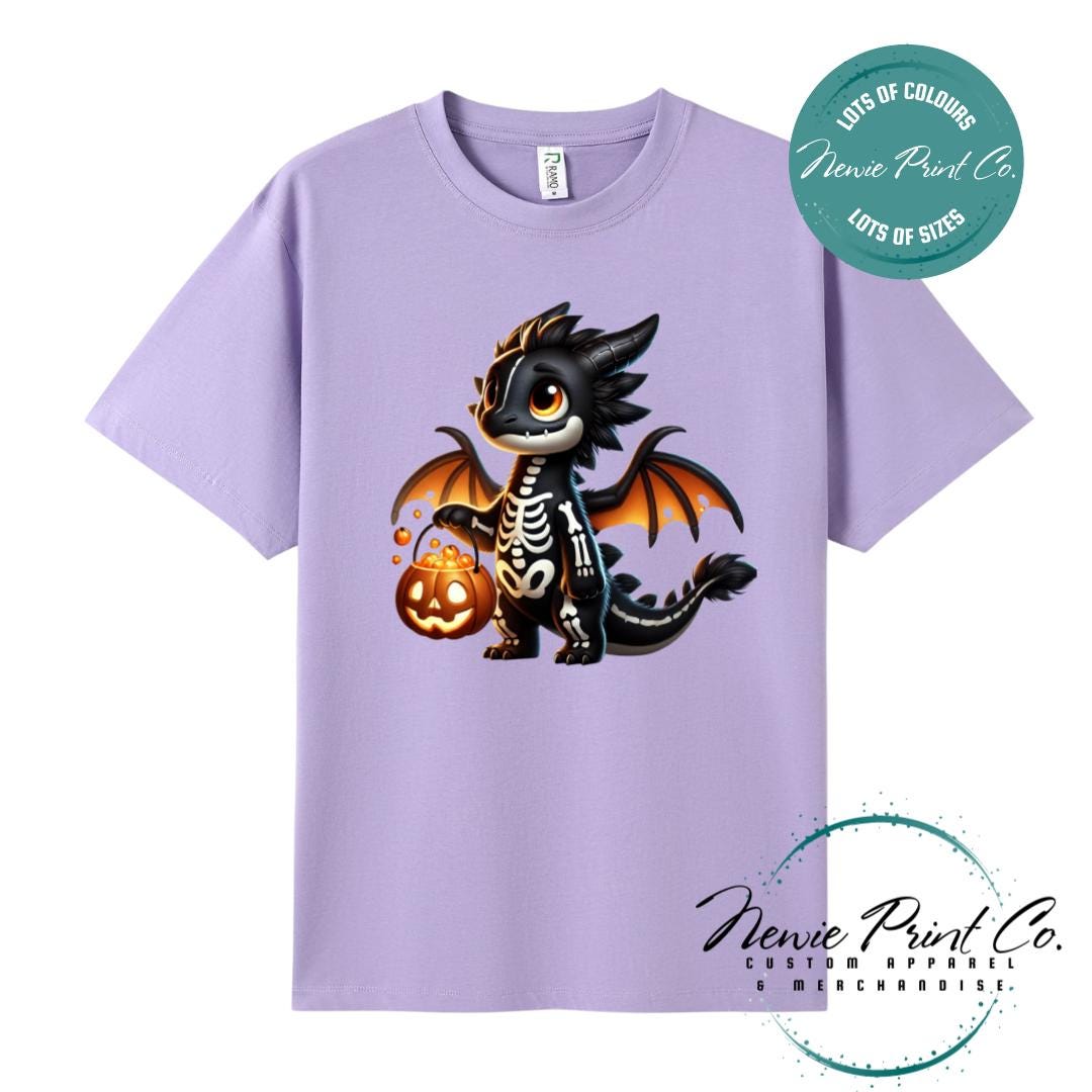 Custom Halloween t-shirts printed in Australia, featuring a cute but spooky black and orange dragon, and optional personalised names underneath - perfect for Halloween parties, school events, or family matching outfits.