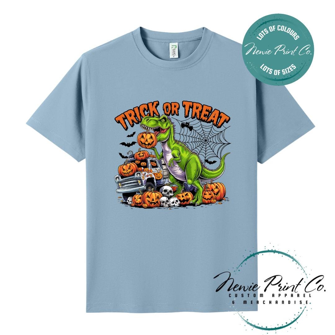 Custom Halloween t-shirts printed in Australia, featuring a spooky dinosaur and monster truck design and optional personalised names — perfect for Halloween parties, school events, or family matching outfits.