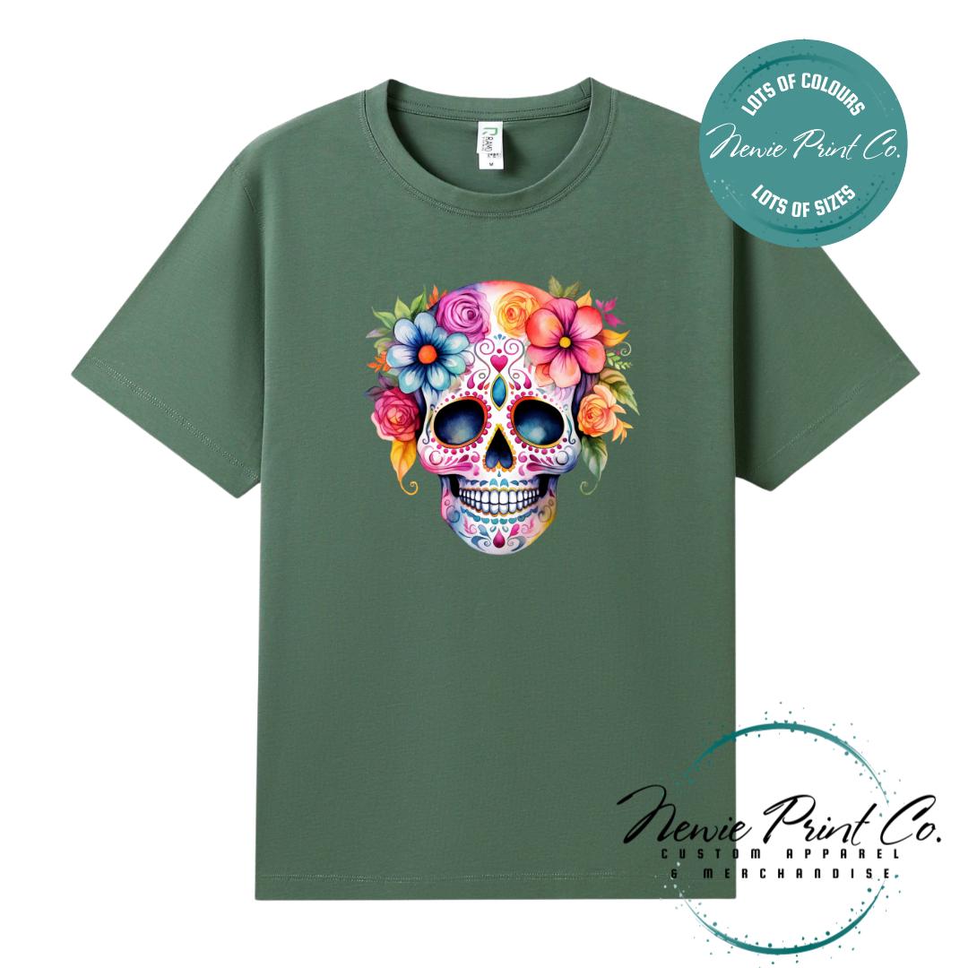 Custom Halloween t-shirts printed in Australia, featuring a floral sugar skull design and optional personalised names — perfect for Halloween parties, school events, or family matching outfits.