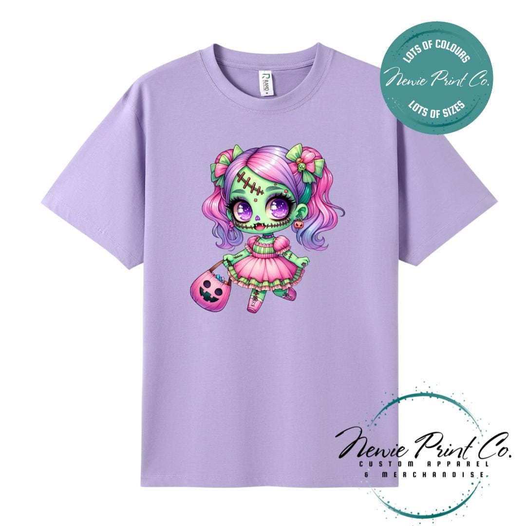 Custom Halloween t-shirts printed by in Australia by Newie Print Co, featuring a cute and spooky zombie girl dressed in pink and purple and optional personalised names — perfect for Halloween parties, school events, or family matching outfits.