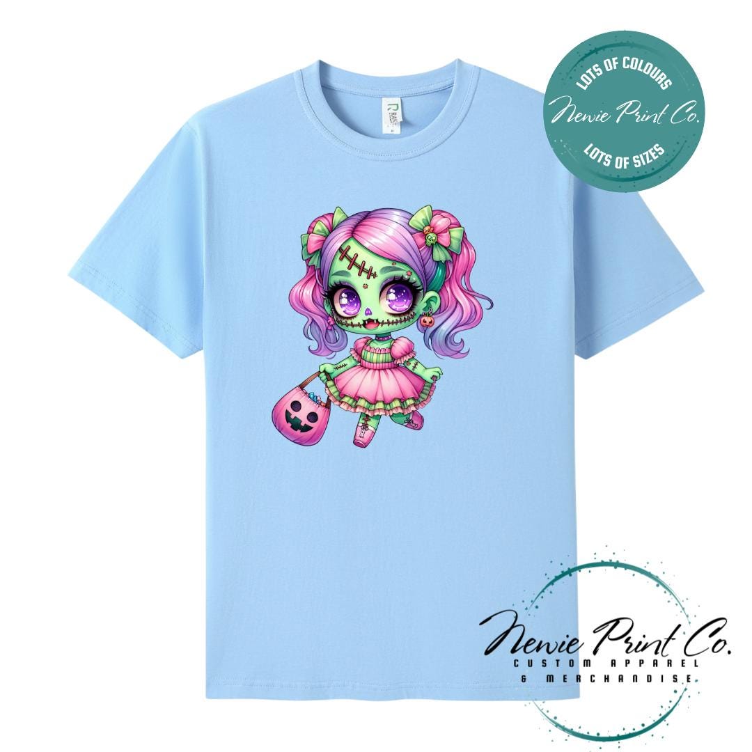 Custom Halloween t-shirts printed by in Australia by Newie Print Co, featuring a cute and spooky zombie girl dressed in pink and purple and optional personalised names — perfect for Halloween parties, school events, or family matching outfits.