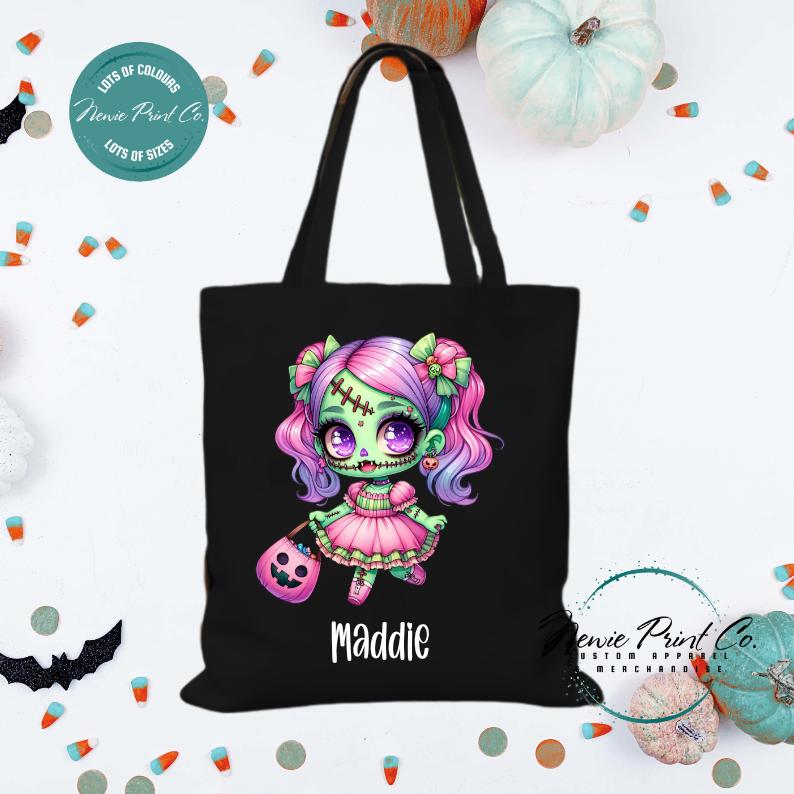 Custom Halloween tote bag with a cute zombie girl dressed in pink and purple, optional personalised name printed on the front, perfect for trick-or-treating or spooky season gifts