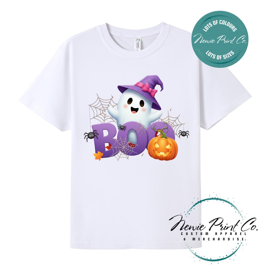 Custom Halloween t-shirts printed in Australia, featuring a cute but spooky design ghost design with the words boo in big bold letters and optional personalised names underneath - perfect for Halloween parties, school events, or family matching outfits.