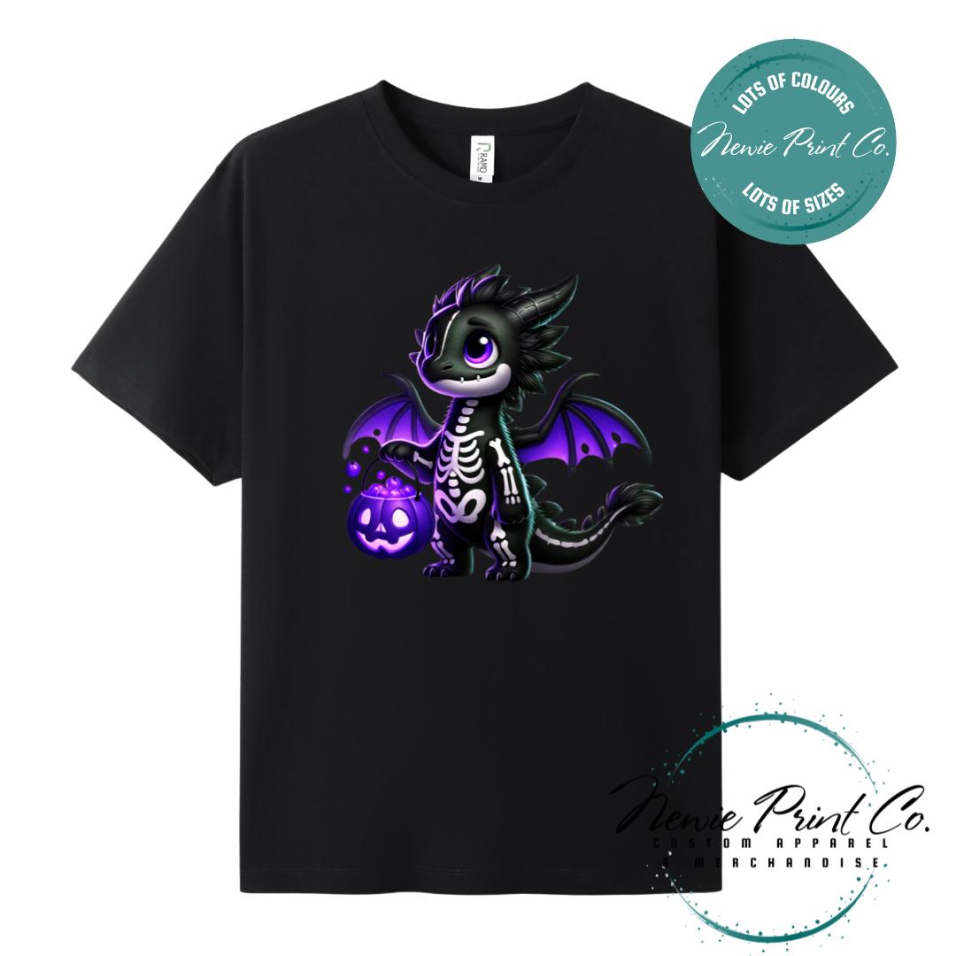 Custom Halloween t-shirts printed in Australia, featuring a cute but spooky black and purple dragon, and optional personalised names underneath - perfect for Halloween parties, school events, or family matching outfits.