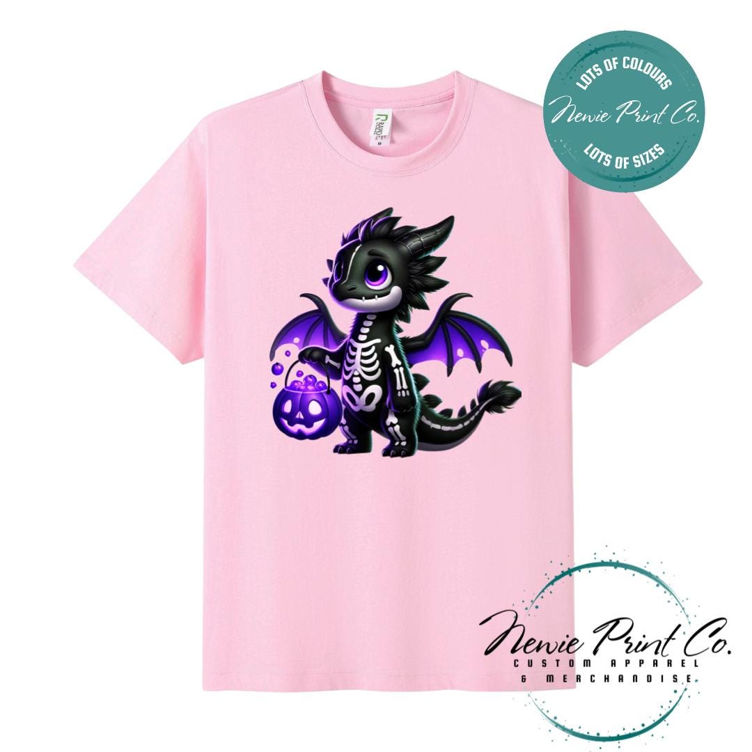 Custom Halloween t-shirts printed in Australia, featuring a cute but spooky black and purple dragon, and optional personalised names underneath - perfect for Halloween parties, school events, or family matching outfits.