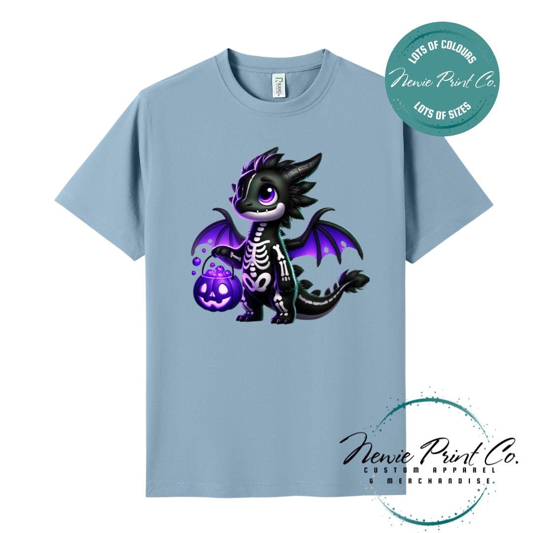 Custom Halloween t-shirts printed in Australia, featuring a cute but spooky black and purple dragon, and optional personalised names underneath - perfect for Halloween parties, school events, or family matching outfits.