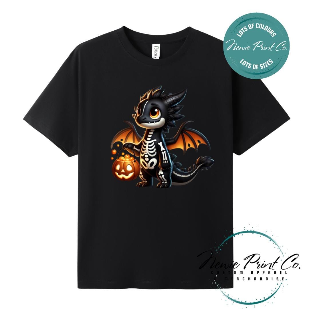 Custom Halloween t-shirts printed in Australia, featuring a cute but spooky black and orange dragon, and optional personalised names underneath - perfect for Halloween parties, school events, or family matching outfits.