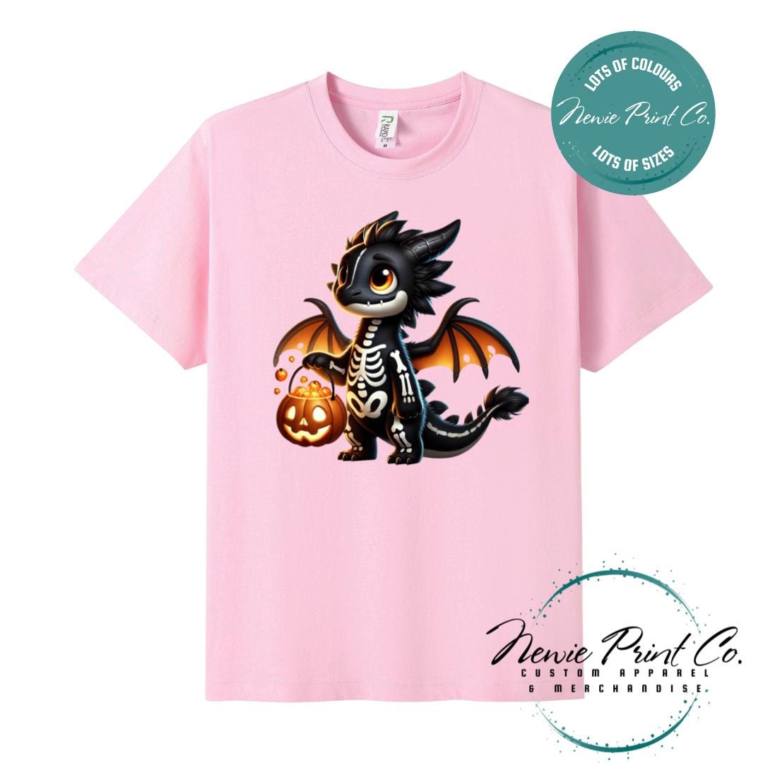Custom Halloween t-shirts printed in Australia, featuring a cute but spooky black and orange dragon, and optional personalised names underneath - perfect for Halloween parties, school events, or family matching outfits.