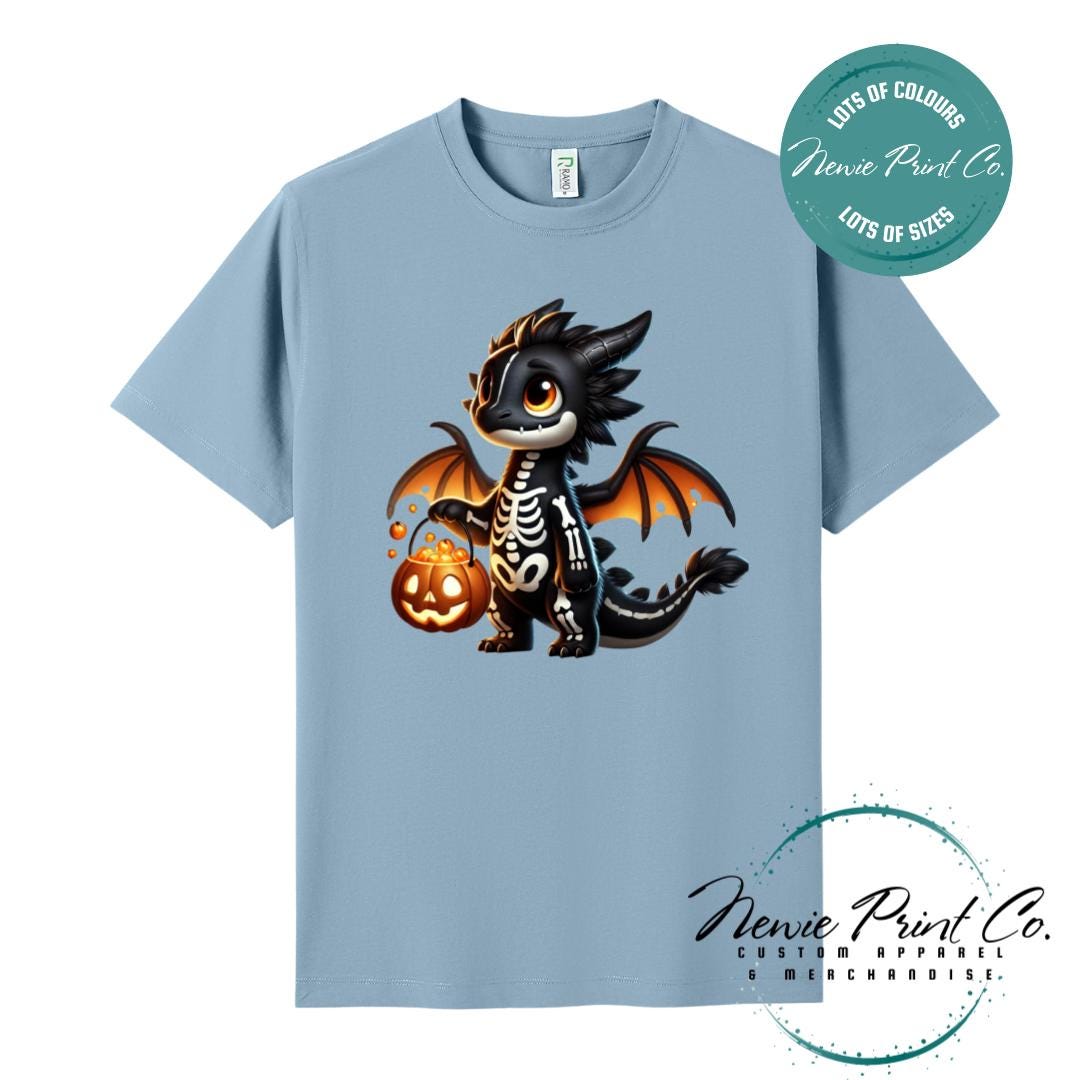 Custom Halloween t-shirts printed in Australia, featuring a cute but spooky black and orange dragon, and optional personalised names underneath - perfect for Halloween parties, school events, or family matching outfits.