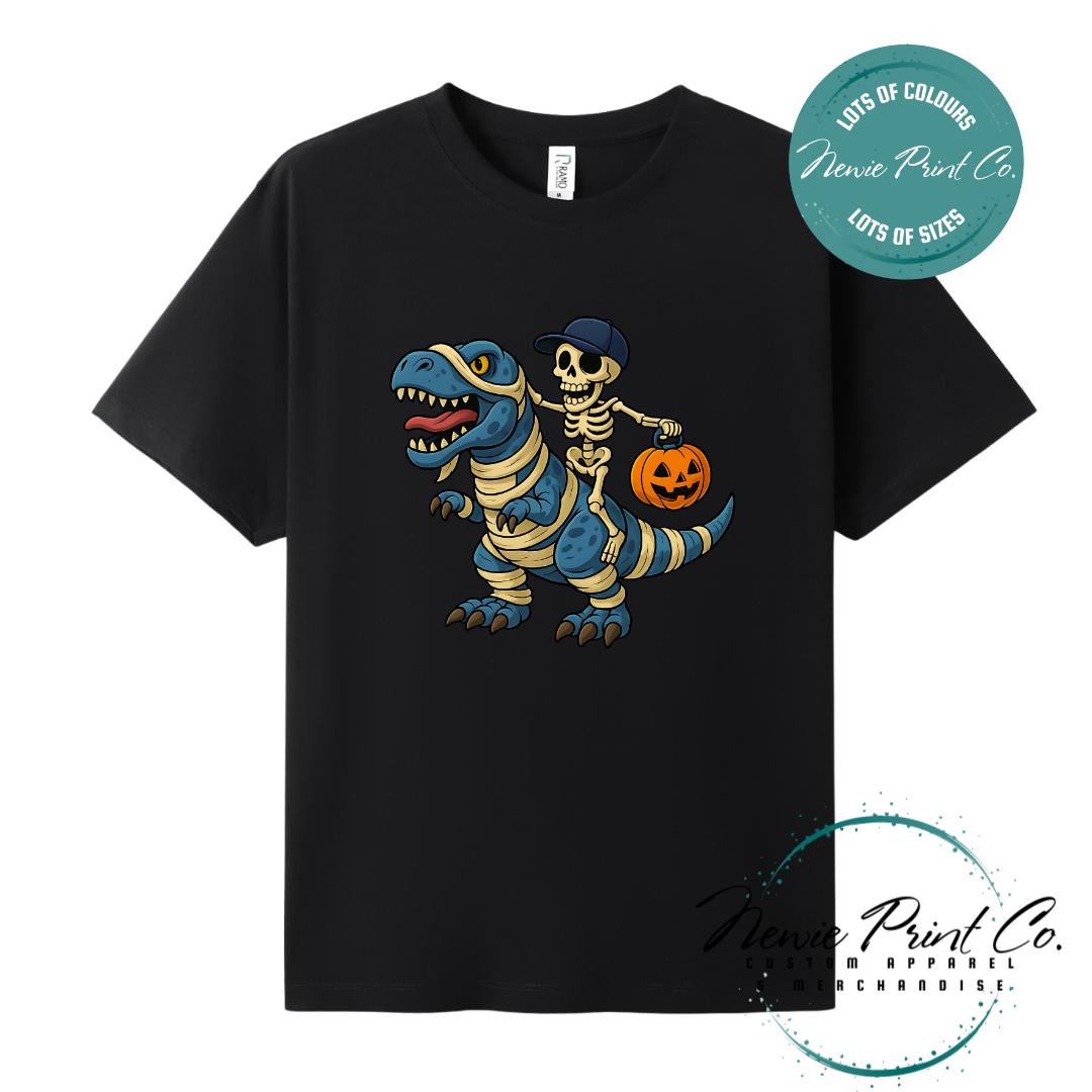 Custom Halloween t-shirts printed by Newie Print Co, featuring spooky designs and optional personalised names — perfect for Halloween parties, school events, or family matching outfits.