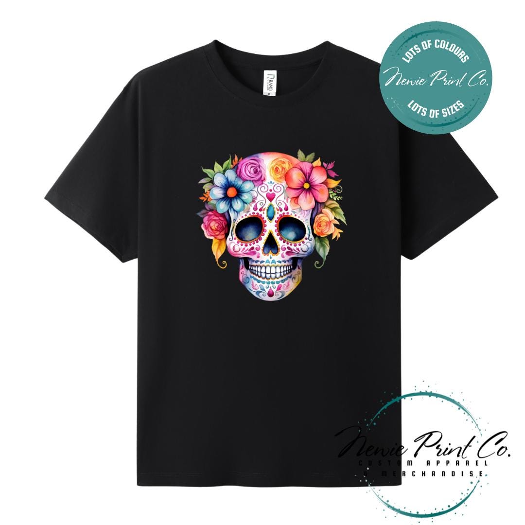 Custom Halloween t-shirts printed in Australia, featuring a floral sugar skull design and optional personalised names — perfect for Halloween parties, school events, or family matching outfits.