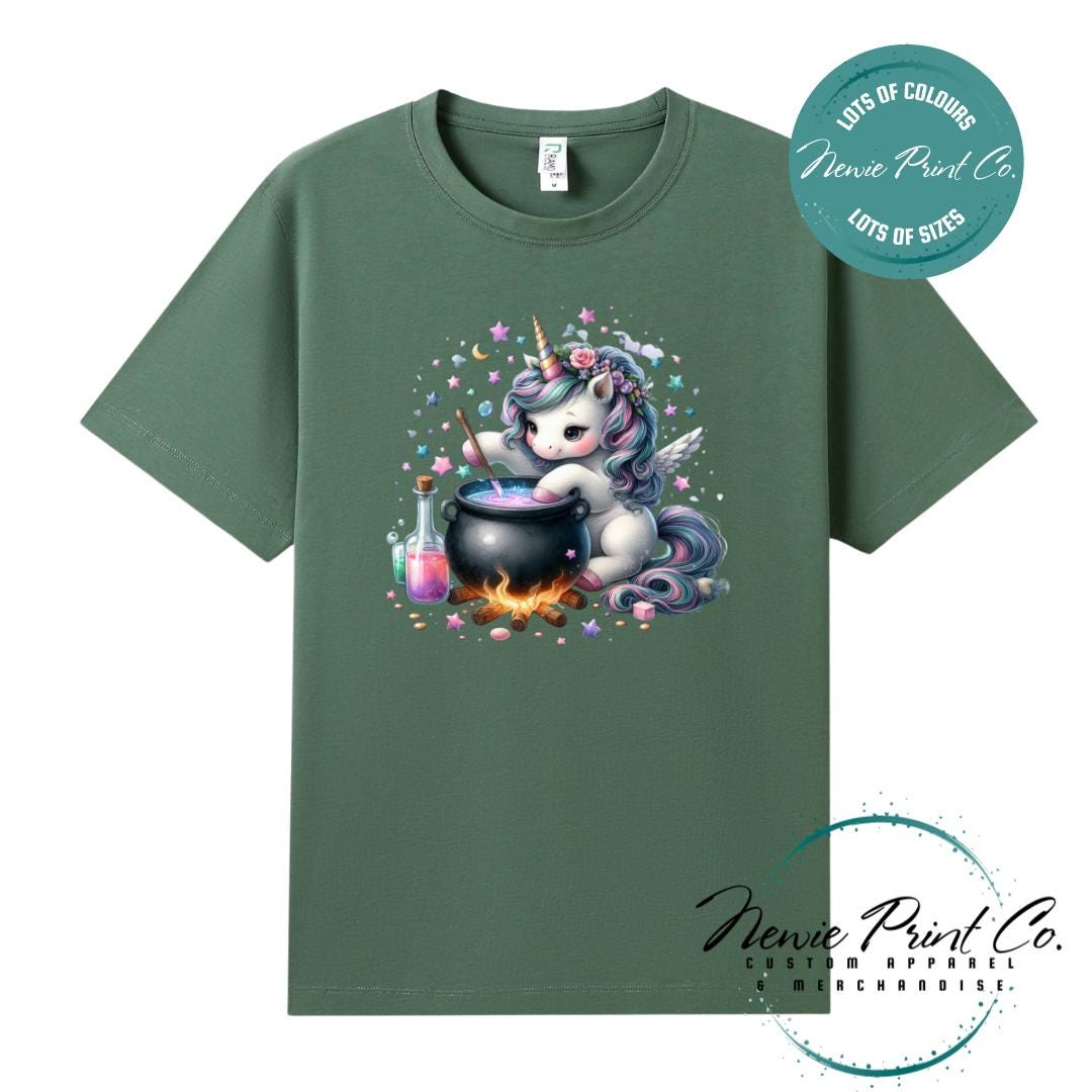 Custom Halloween t-shirts printed in Australia, featuring a cute and spooky unicorn and cauldron design and optional personalised names — perfect for Halloween parties, school events, or family matching outfits.