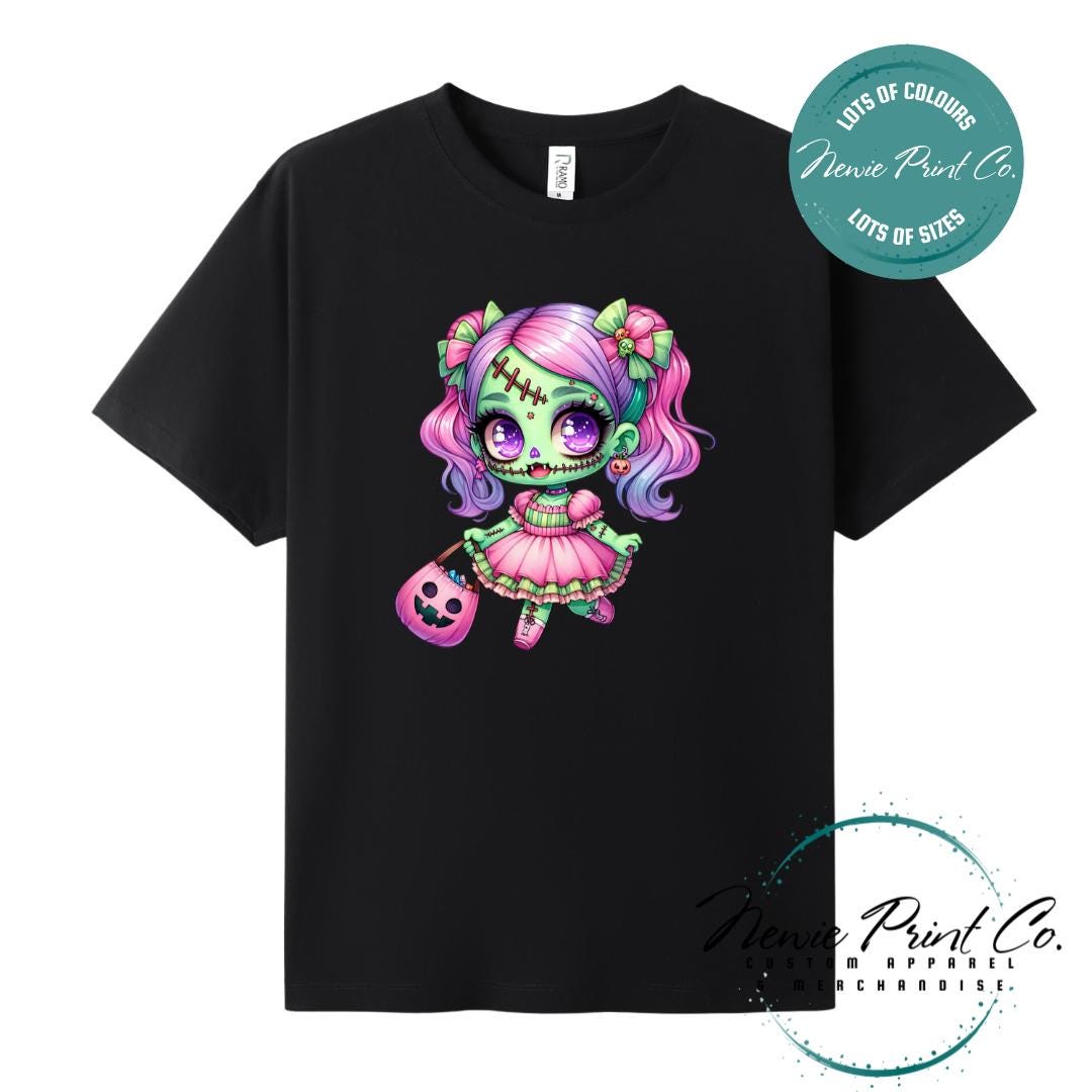 Custom Halloween t-shirts printed by in Australia by Newie Print Co, featuring a cute and spooky zombie girl dressed in pink and purple and optional personalised names — perfect for Halloween parties, school events, or family matching outfits.