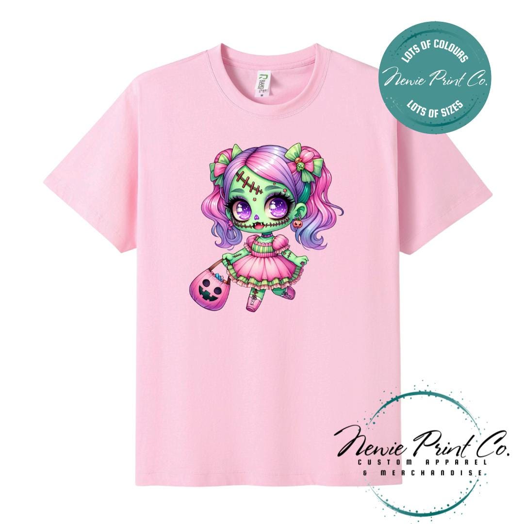 Custom Halloween t-shirts printed by in Australia by Newie Print Co, featuring a cute and spooky zombie girl dressed in pink and purple and optional personalised names — perfect for Halloween parties, school events, or family matching outfits.