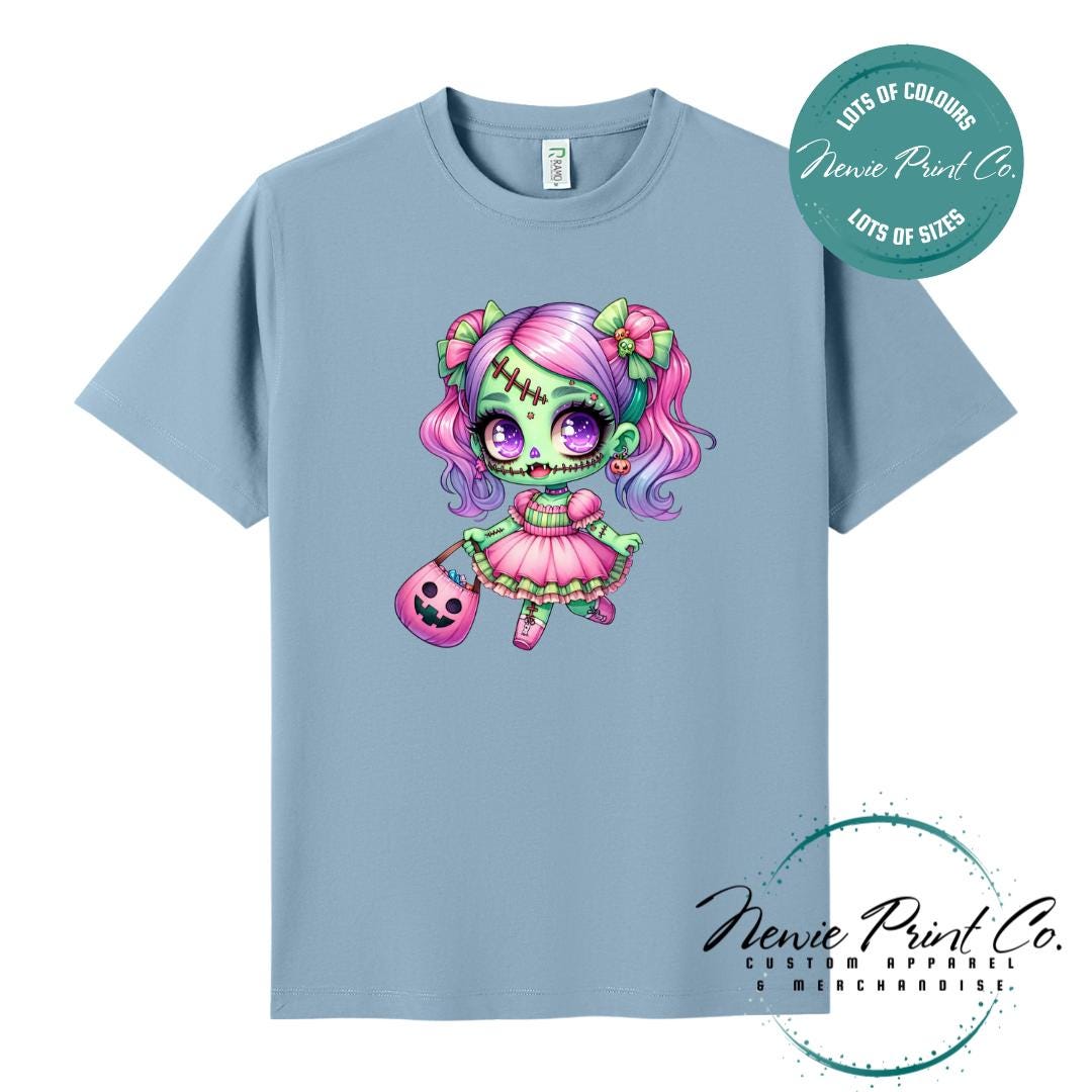Custom Halloween t-shirts printed by in Australia by Newie Print Co, featuring a cute and spooky zombie girl dressed in pink and purple and optional personalised names — perfect for Halloween parties, school events, or family matching outfits.