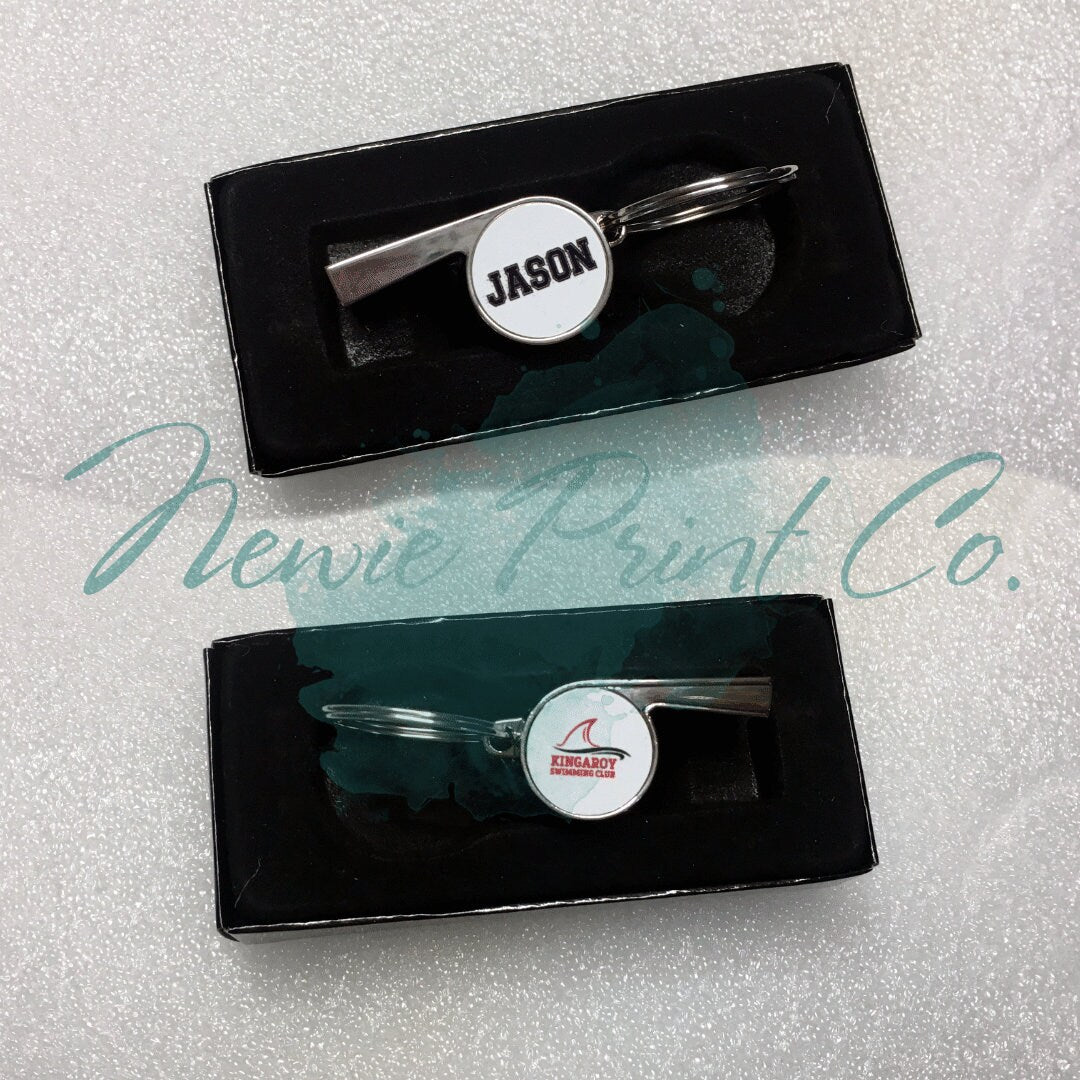 Custom printed whistle keyring gift for coach or teacher, personalised with name and team logo, displayed in gift box from Newie Print Co.