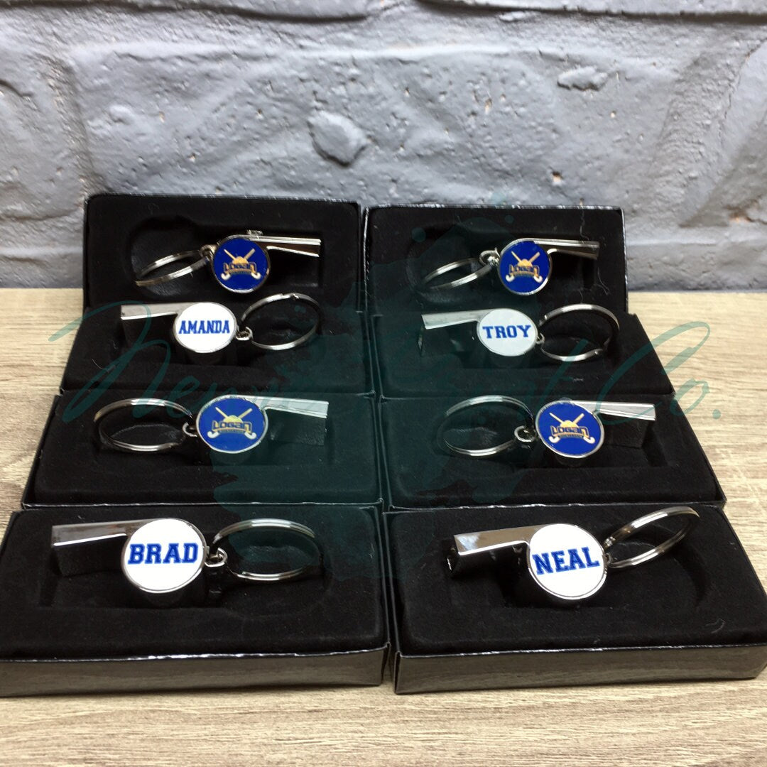 Custom printed whistle keyring gift for coach or teacher, personalised with name and team logo, displayed in gift box from Newie Print Co.