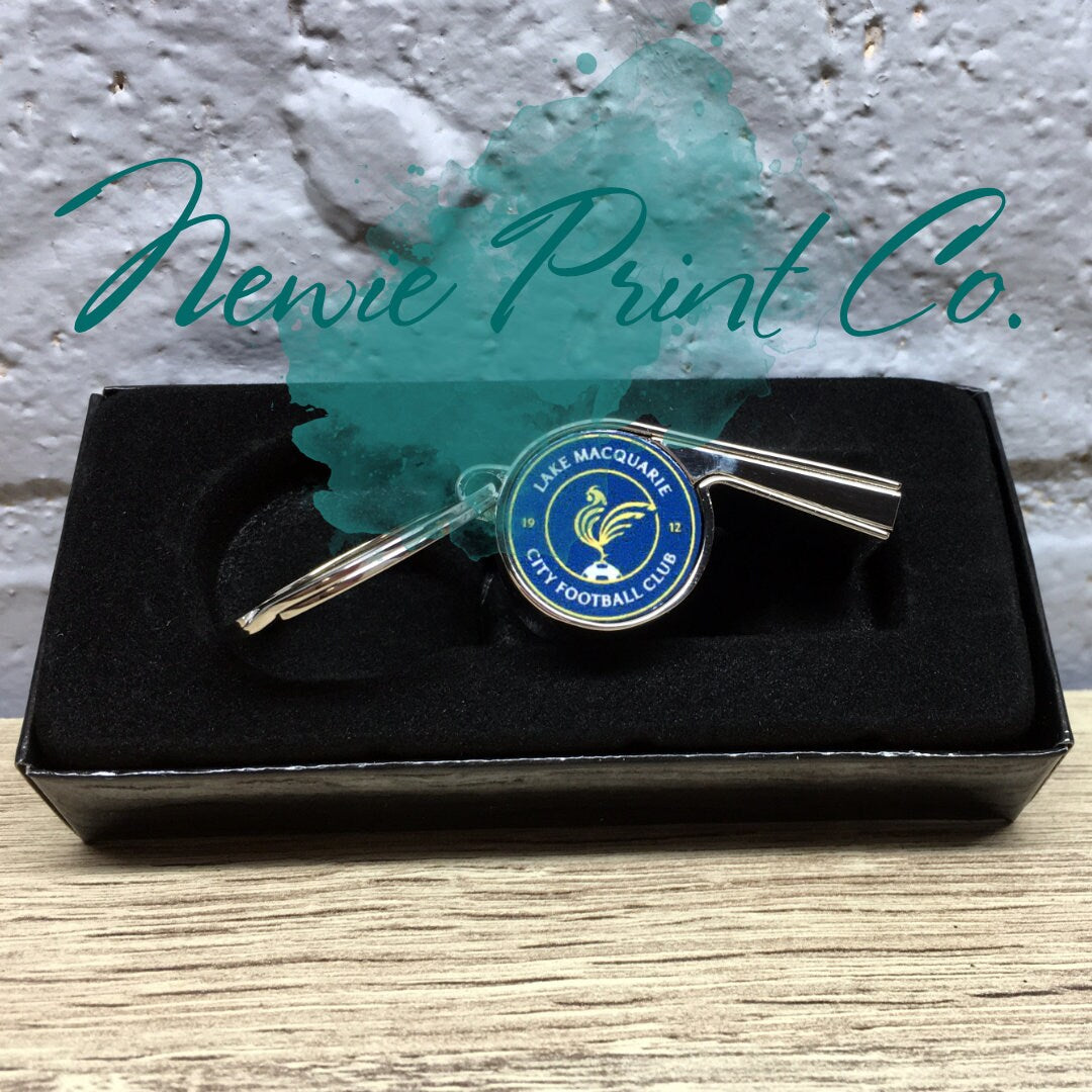 Custom printed whistle keyring gift for coach or teacher, personalised with name and team logo, displayed in gift box from Newie Print Co.