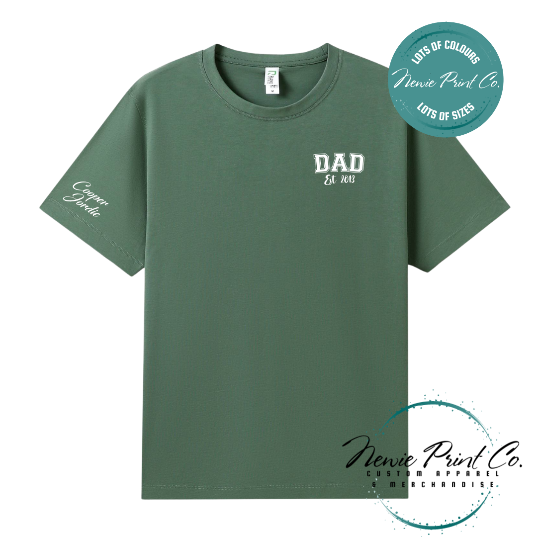 Personalised Dad t-shirt and jumper with “Dad Est. [Year]” on the chest and kids' names printed on the sleeve. Custom Father’s Day gift made from soft cotton, featuring high-quality DTF/DTG print. Unique gift for dads, birthdays, or new fathers.
