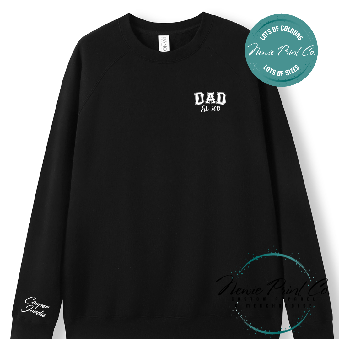 Personalised Dad t-shirt and jumper with “Dad Est. [Year]” on the chest and kids' names printed on the sleeve. Custom Father’s Day gift made from soft cotton, featuring high-quality DTF/DTG print. Unique gift for dads, birthdays, or new fathers.