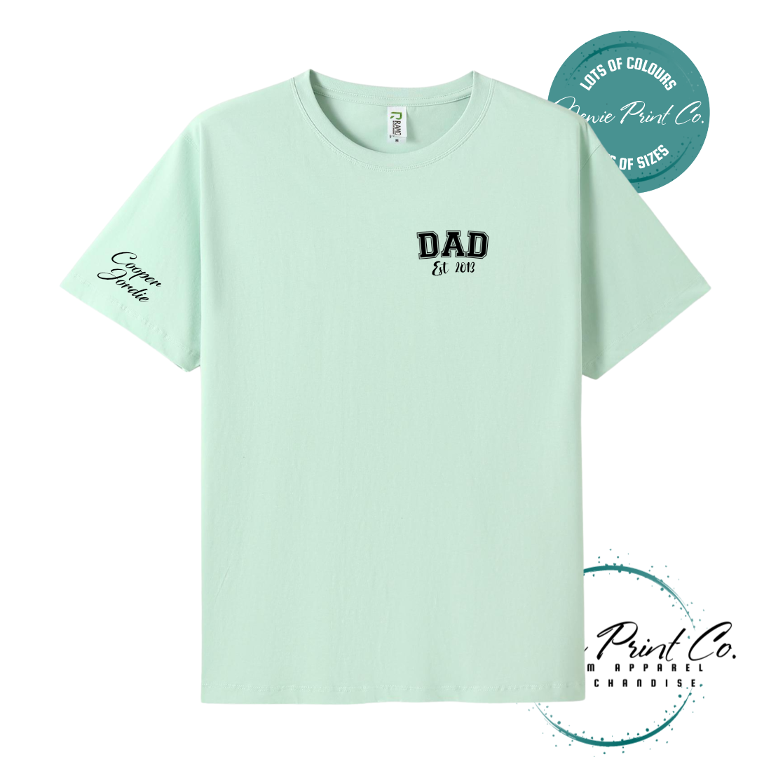 Personalised Dad t-shirt and jumper with “Dad Est. [Year]” on the chest and kids' names printed on the sleeve. Custom Father’s Day gift made from soft cotton, featuring high-quality DTF/DTG print. Unique gift for dads, birthdays, or new fathers.