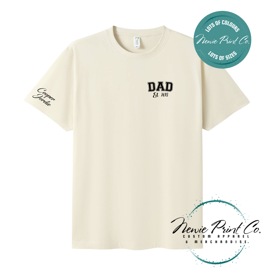 Personalised Dad t-shirt and jumper with “Dad Est. [Year]” on the chest and kids' names printed on the sleeve. Custom Father’s Day gift made from soft cotton, featuring high-quality DTF/DTG print. Unique gift for dads, birthdays, or new fathers.
