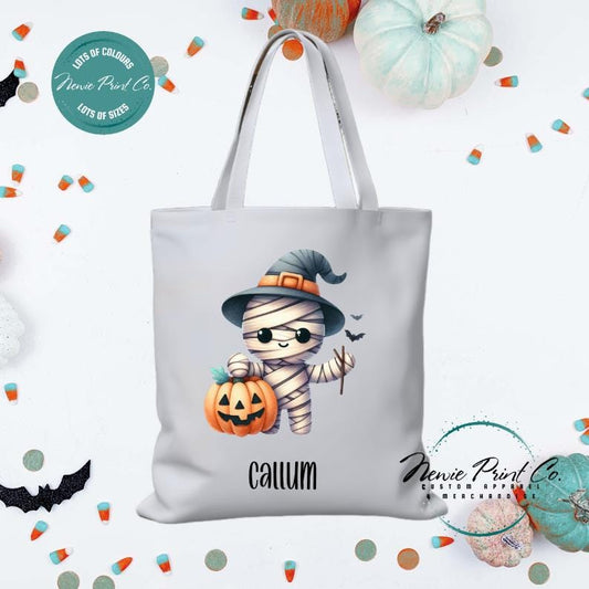 Custom Halloween tote bag with a cute zombie scarecrow, optional personalised name printed on the front, perfect for trick-or-treating or spooky season gifts