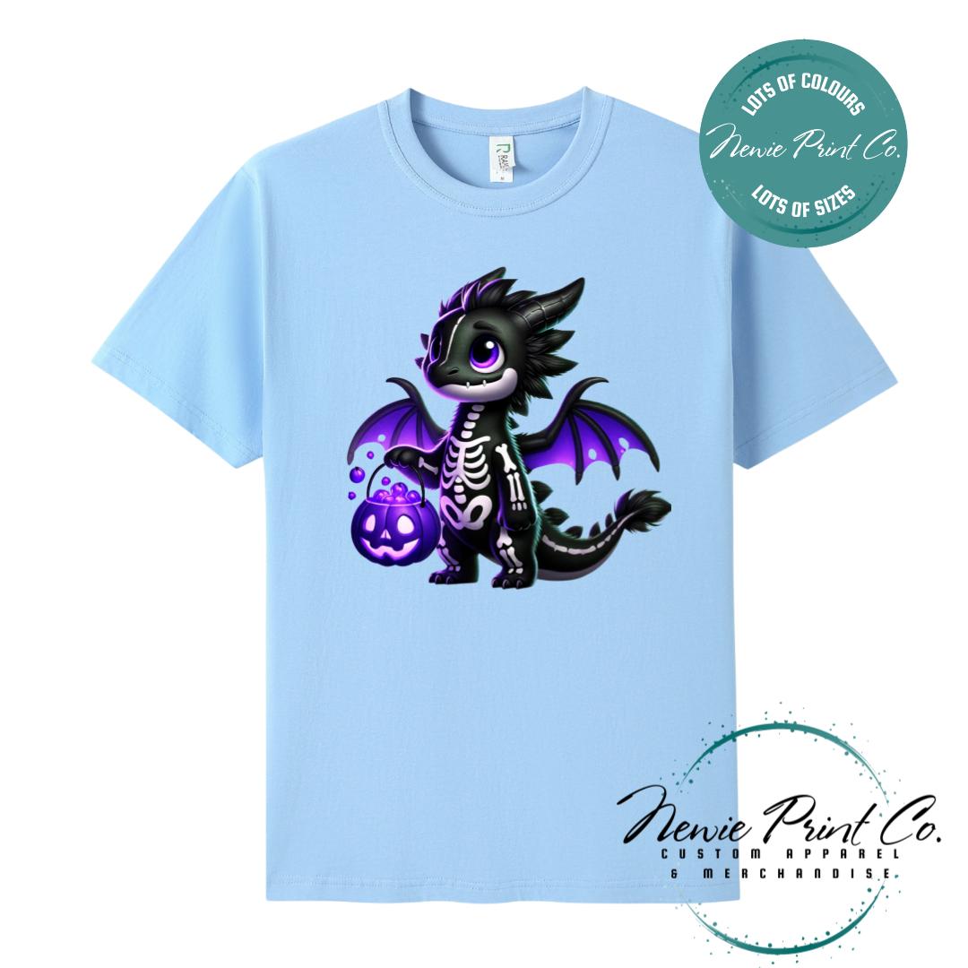 Custom Halloween t-shirts printed in Australia, featuring a cute but spooky black and purple dragon, and optional personalised names underneath - perfect for Halloween parties, school events, or family matching outfits.