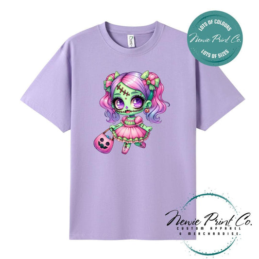 Custom Halloween t-shirts printed by in Australia by Newie Print Co, featuring  a cute and spooky zombie girl dressed in pink and purple and optional personalised names — perfect for Halloween parties, school events, or family matching outfits.