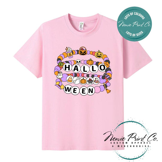Custom Halloween t-shirts printed by in Australia, featuring a spooky friendship bracelet designs and optional personalised names — perfect for Halloween parties, school events, or family matching outfits.