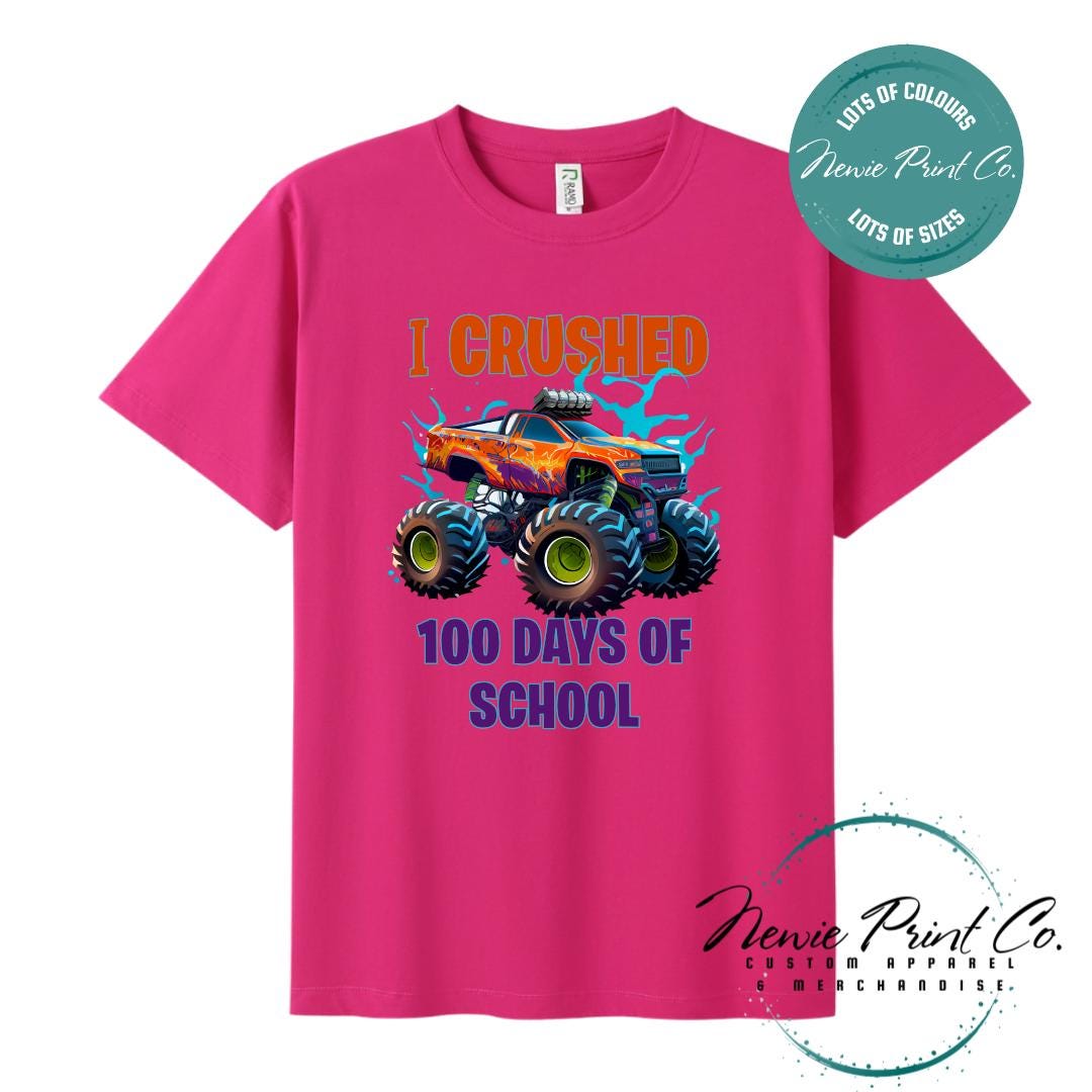 Hot Pink 100 Days of School t-shirt featuring a bold monster truck graphic with the text “I Crushed 100 Days of School,” designed for students or teachers to celebrate the 100th day of school milestone in a fun, playful way. Available in both adult and kids sizes.