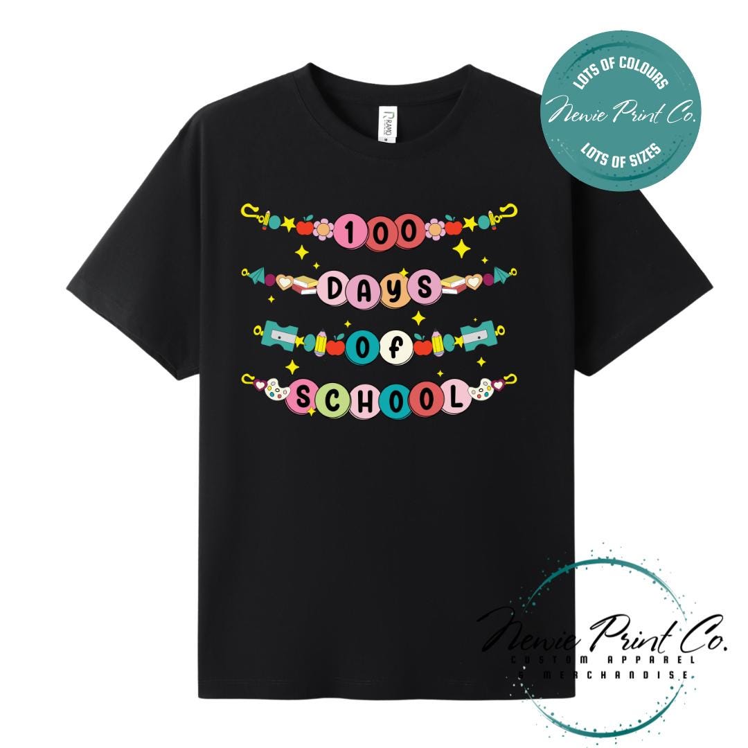 Black 100 Days of School t-shirt featuring a colourful friendship bracelet with the text “100 Days of School,” designed for students or teachers to celebrate the 100th day of school milestone in a fun, playful way. Available in both adult and kids sizes.