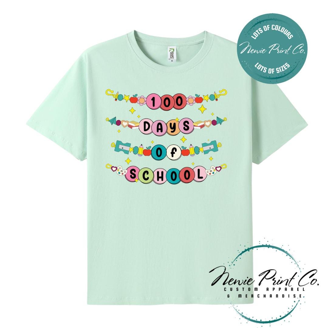 Mint Green 100 Days of School t-shirt featuring a colourful friendship bracelet with the text “100 Days of School,” designed for students or teachers to celebrate the 100th day of school milestone in a fun, playful way. Available in both adult and kids sizes.