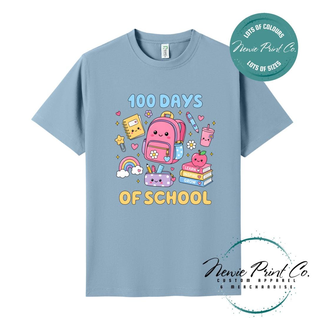 Seafoam Blue 100 Days of School t-shirt featuring acute graphic featuring essential school items like a backpack and pencil case cute star paperclip and more with the text “100 Days of School,” designed for students or teachers to celebrate the 100th day of school milestone in a fun, playful way. Available in both adult and kids sizes.