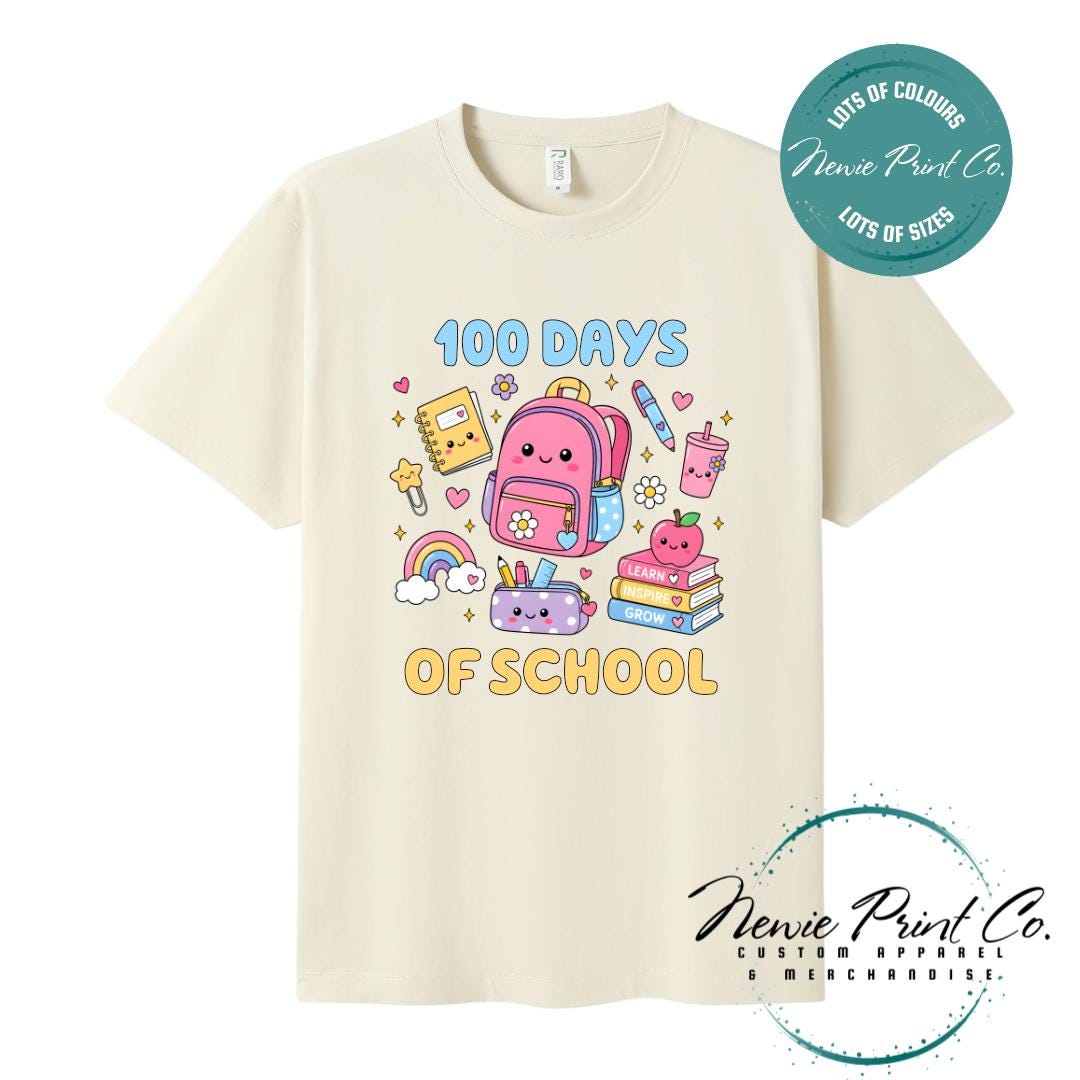 Natural 100 Days of School t-shirt featuring acute graphic featuring essential school items like a backpack and pencil case cute star paperclip and more with the text “100 Days of School,” designed for students or teachers to celebrate the 100th day of school milestone in a fun, playful way. Available in both adult and kids sizes.